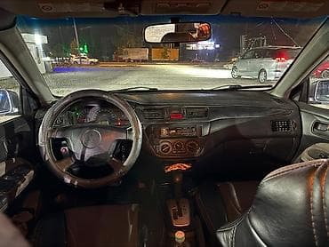 кира: Mitsubishi Lancer: 2004 г., 1.6 л, Автомат, Бензин, Седан — 5
