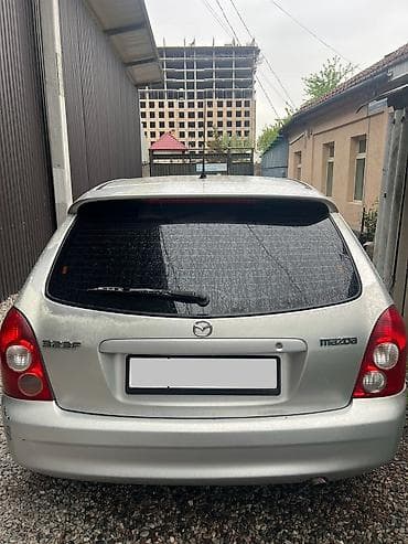 super maz samosval: Mazda 323: 2002 г., 1.6 л, Ручные, Бензин, Хэтчбэк — 1