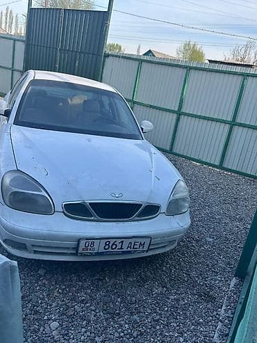 Daewoo Nexia: 1999 г., 1.6 л, Кол менен иштөөчү, Бензин, Седан — 5