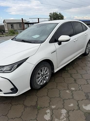 Toyota Corolla: 2021 г., Гибрид, Седан — 2