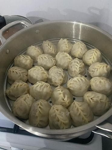 Жер-жемиштер: Манты — домашние, ручная лепка Меню: - Манты с мясом — 250 сом (50 — 2