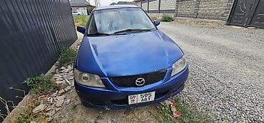 Mazda 323: 2002 г., 1.6 л, Механика