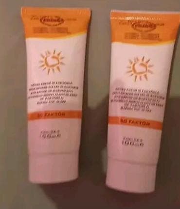 Парфюмерия: Солнцезащитный крем для лица и тела в тубе - Формат: тюбик - — 1