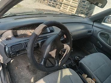 bid e2: Mazda 323: 1992 г., 1.8 л, Ручные, Бензин, Седан — 1