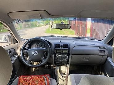 мазда 3: Mazda 626: 1999 г., 1.8 л, Механика, Бензин, Седан — 1