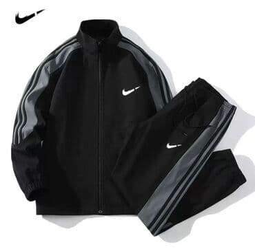 Прокат одежды: Спортивный костюм Nike, черный с серо‑графитовыми лампасами. Состав — 1