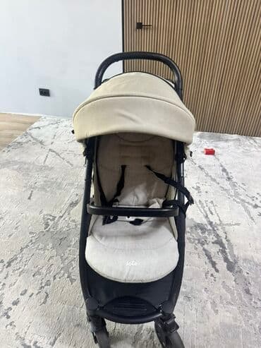 музыкальная игрушка: Коляска — 2