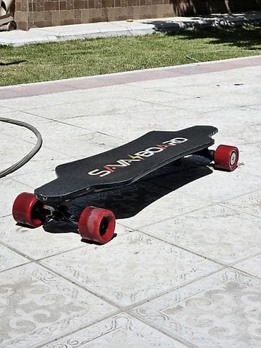 реалии: Электрический лонгборд Dual Motor. Максимальная скорость 32 км/ч — 1