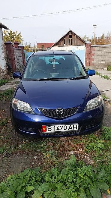 чехлы бу: Mazda Demio: 2004 г., Автомат, Бензин, Хэтчбэк — 1
