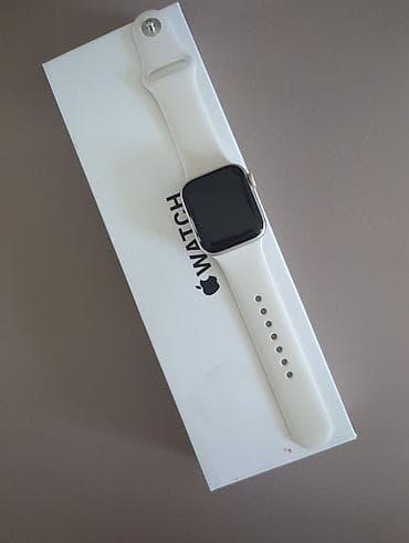 Умные часы Apple Watch SE 3 в цвете Starlight и бежевым ремешком из at lalafo.kg Умные часы Apple Watch SE 3 в цвете Starlight и бежевым ремешком из