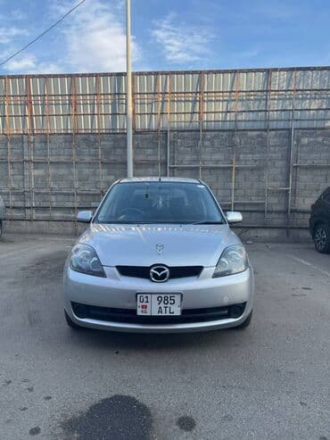 обтекатель на портер 1: Mazda Demio: 2003 г., 1.3 л, Автомат, Бензин, Хэтчбэк — 1