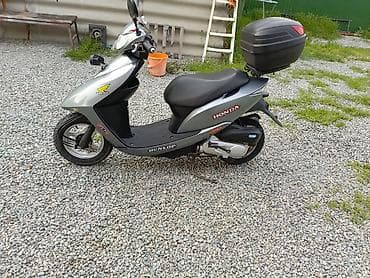 dio 27 af27: Скутер Honda (серия Dio) в серебристом цвете. Характеристики и — 6