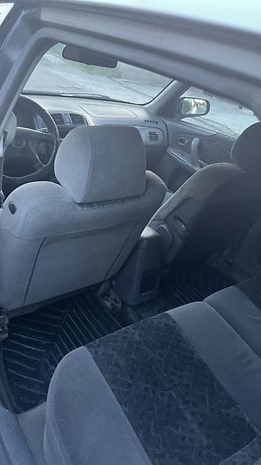 шевролет монзо: Mazda 323: 1999 г., 1.5 л, Механика, Бензин, Хэтчбэк — 5