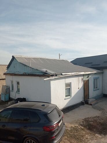 адресная табличка на частный дом: Одноэтажный жилой дом с двускатной крышей из профнастила — 1