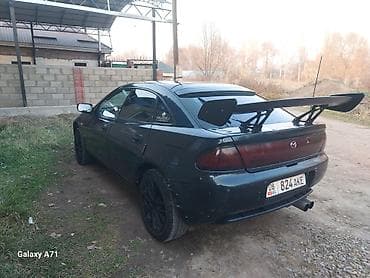 Mazda Lantis: 1995 г., Хэтчбэк