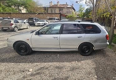 Транспорт: Nissan Primera: 2002 г., 1.8 л, Ручные, Бензин, Универсал — 5