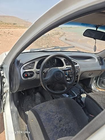 тад 600: Daewoo Lanos: 1998 г., Механика, Бензин, Седан — 3