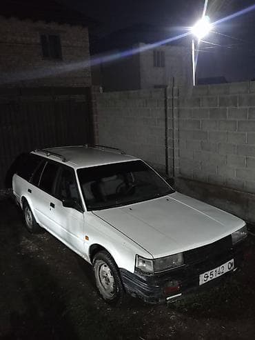 byd e5: Nissan Bluebird: 1988 г., 2 л, Механика, Универсал — 6