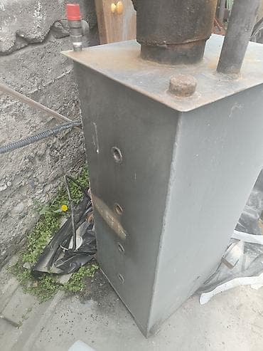 Металлическая твердотопливная печь-отопитель с дымоходом и датчиком — 4