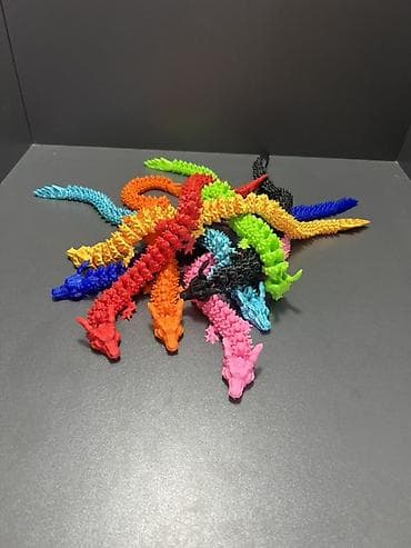 Брелоки: Гибкие 3D‑печатные драконы/антистресс - Комплект ярких фигурок — 7
