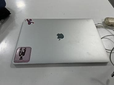 macbook 11: Apple MacBook Pro 15" с Touch Bar (серия 2017) - Экран Retina — 2