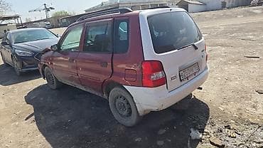битое авто: Mazda Demio: 2000 г., Автомат, Бензин, Универсал — 1