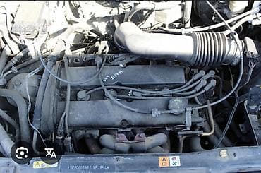 mazda 10: Бензиновый мотор Ford 2 л — 1