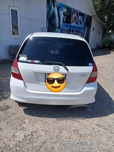 салон автомобиля: Honda Fit: 2003 г., 1.3 л, Автомат, Бензин, Хэтчбэк — 2