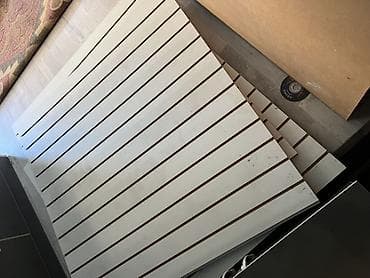 Стеновые панели с продольными пазами (слот-панели) б/у по 1000 в