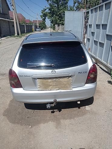mazda mx: Mazda 323: 2001 г. — 4