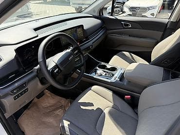 reno t: Kia Carnival: 2025 г., 1.6 л, Автомат, Гибрид, Минивэн — 5