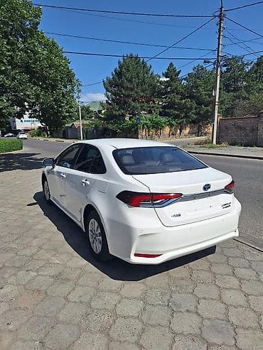 e2 byd: Toyota Corolla: 2022 г., 1.8 л, Вариатор, Гибрид, Седан — 7