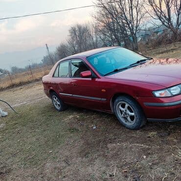 Mazda 626: 1996 г., 1.8 л, Механика, Бензиновая, Седан — 4
