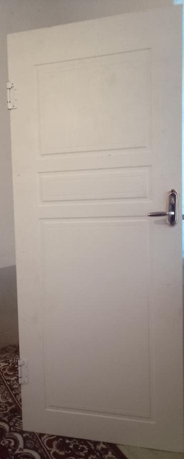 Металл сейф эшиктери: Межкомнатная дверь белого цвета с классическими филёнками. - — 1