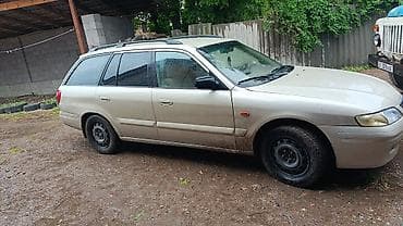 Транспорт: Mazda Capella: 2002 г., 1.8 л, Механика, Бензин, Универсал — 2