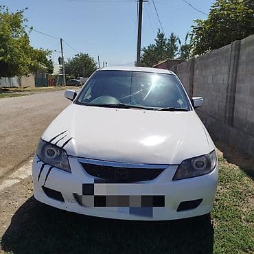 gac gs3: Mazda Familia: 2001 г., 1.3 л, Автомат, Бензин, Седан — 2
