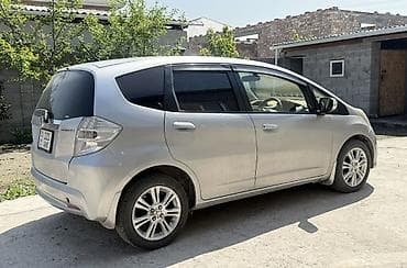 zimmer e9 pro: Honda Fit: 2011 г., 1.3 л, Вариатор, Гибрид, Хэтчбэк — 3