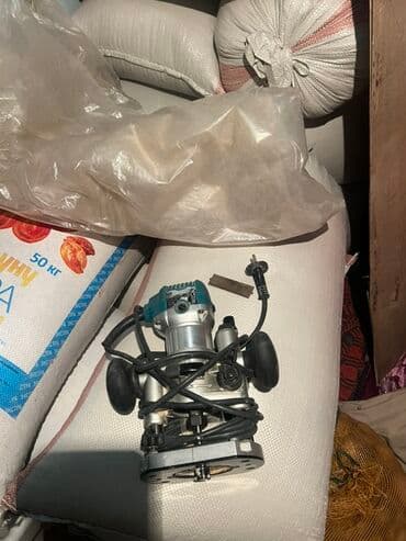 фрезы по дереву: Электрический фрезер Makita, предназначенный для выполнения различных — 1