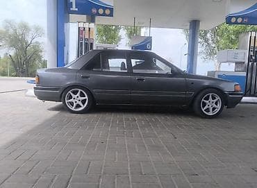Mazda 323: 1990 г., Механика, Бензин, Седан