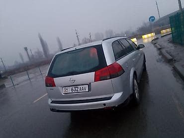 именные рамки на авто: Opel Vectra: 2005 г., 2.2 л, Ручные, Универсал — 1