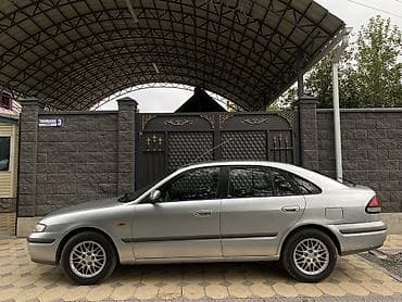 авто в такси: Mazda 626: 1999 г., 2 л, Механика, Бензин, Седан — 2