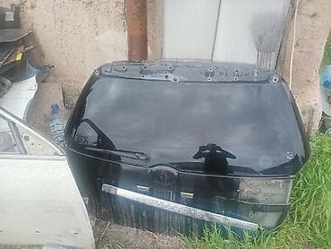 шпатлевка для авто: Крышка багажника Toyota, 2004 г., Б/у, Оригинал — 1