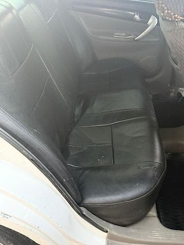 моно на венто: Daewoo Magnus: 2004 г., 2 л, Механика, Бензин, Седан — 7