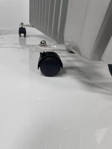 масляный обогреватели: Масляный обогреватель Кол-во секций: 10 и более, Защита от замерзания, Быстрый нагрев, Встроенный вентилятор — 4