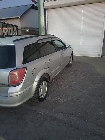 gac aion s 2021: Opel Astra: 2005 г., Механика, Универсал — 7
