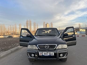 byd song plus ev: Ssangyong Musso: 2000 г., 2.9 л, Автомат, Дизель, Внедорожник — 1