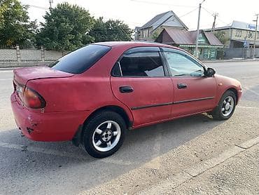 1994: Mazda 323: 1994 г., 1.6 л, Автомат, Бензин, Седан — 3