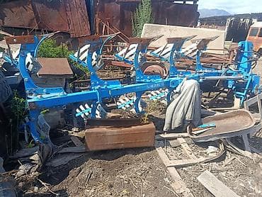 тормозной суппорт: Навесной оборотный плуг Lemken (судя по окраске и конструкции) — 2