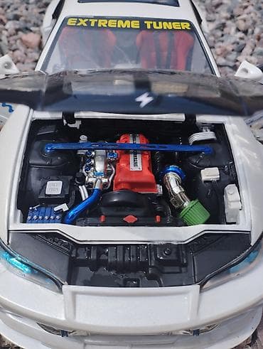 Спорт и отдых: Модель машины 1/12 NISSAN SILVIA 
NISSAN Motor c o.,L t D — 4