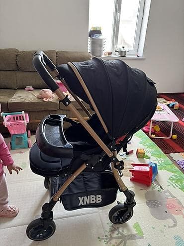 Коляскалар: Удобная детская коляска XNBB в черном цвете с рамой под дерево — 5